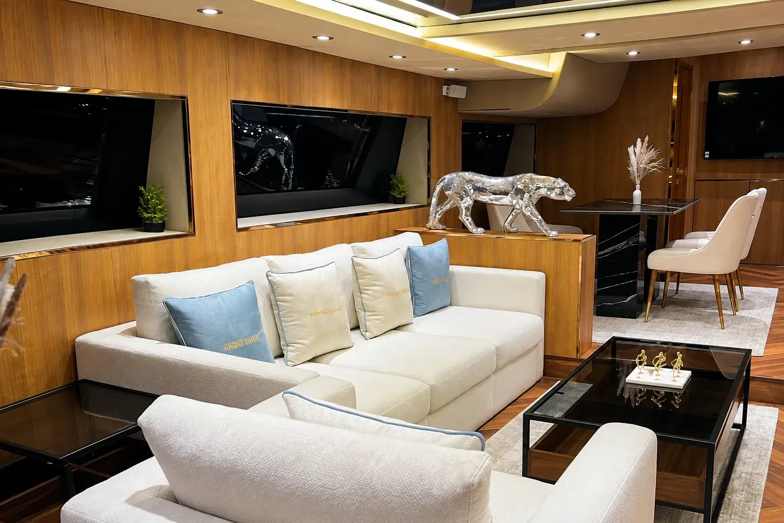Illustration of the I Don't Know saloon, with timber-panelled walls, an ivory sofa with pale blue cushions, a silver panther sculpture and a black marble dining table