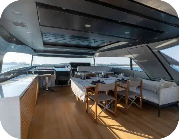 Lorenzo covered upper deck with a dining table, bar counter and lounge seating under the hardtop