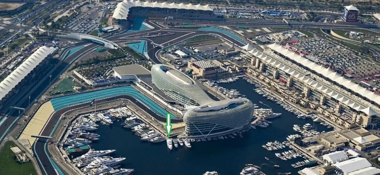 Aerial view of Yas Marina Circuit with Berth E134 marked beside the track