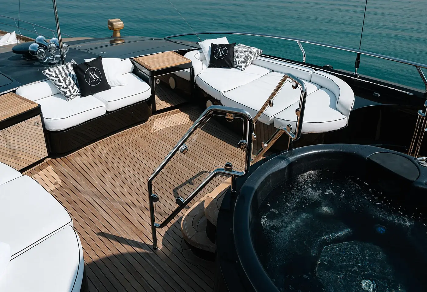 Top-deck jacuzzi and sun loungers on AK Royalty